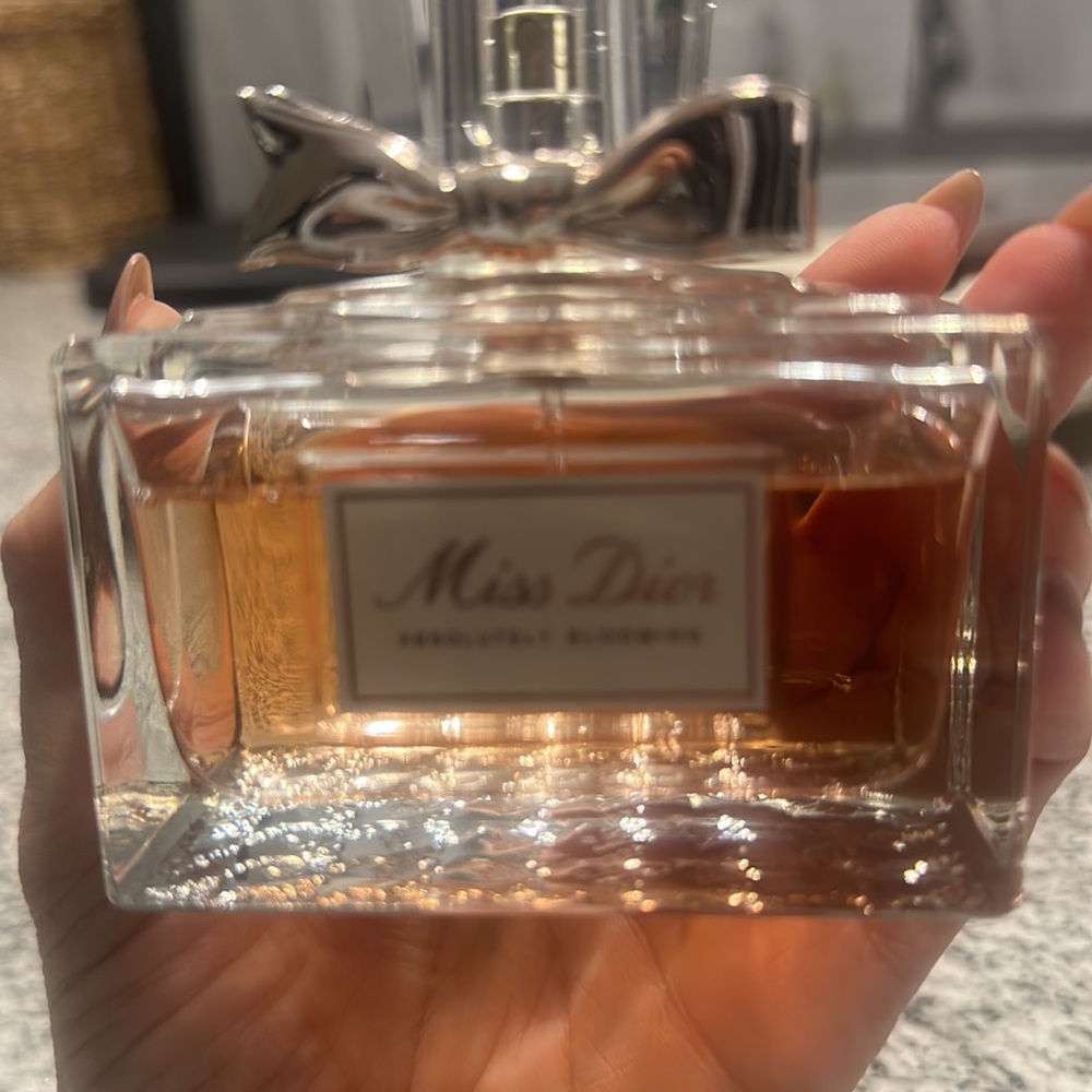 Miss Dior 3.4 oz absolutely blooming .. pretty much full
